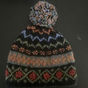 Rising Tide NWOT woolly at with Pom Pom and polar fleece lining